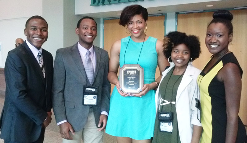 Members of Northwestern’s NABJ chapter, display the Student Chapter of the Year award they won at the national NABJ convention.