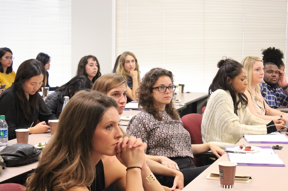 Medill students listen to presentation at health care reporting conference