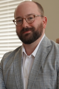 Headshot for Adam Ganucheau