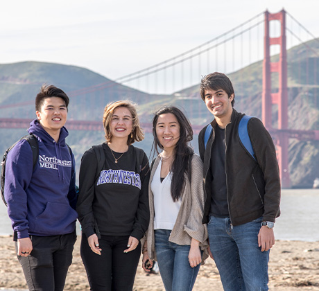 Students in front of the Golden Gate Bridge.