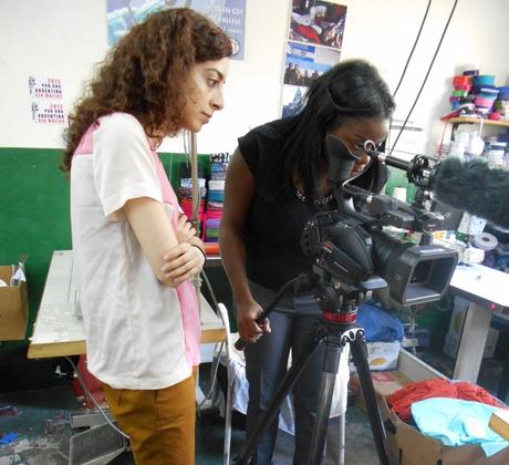 Two students filming.