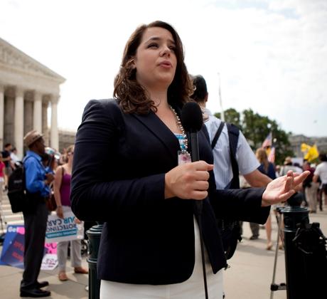 A student reporting in front of the Supreme Court.