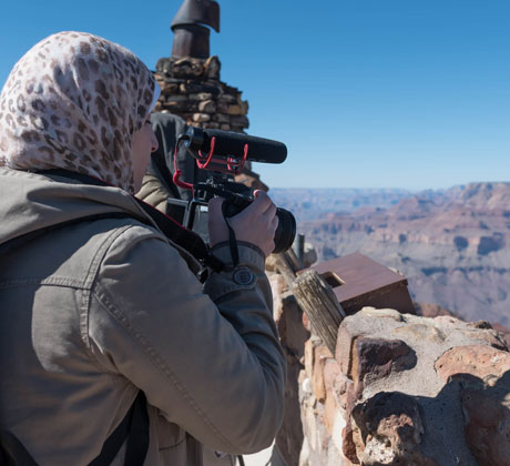 Student working with a video camera.