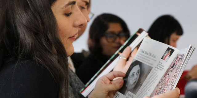 Woman reading a magazine