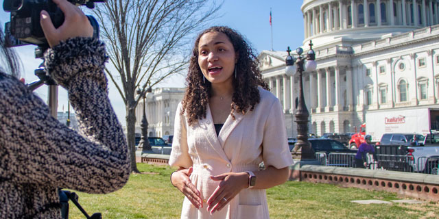 A student reporter outside the White House