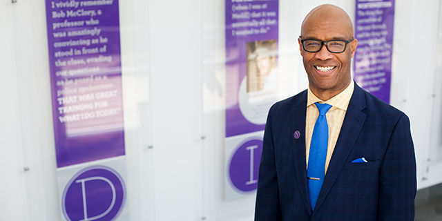 Headshot of Dean Charles Whitaker.