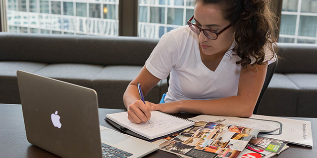 Student looking at laptop