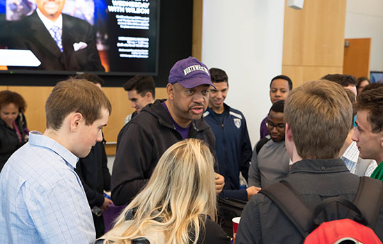 ESPN Commentator Michael Wilbon talking to a group of students.