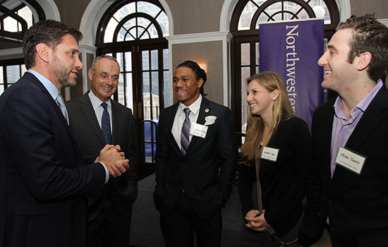 Mike Greenberg alumnus talking to a group