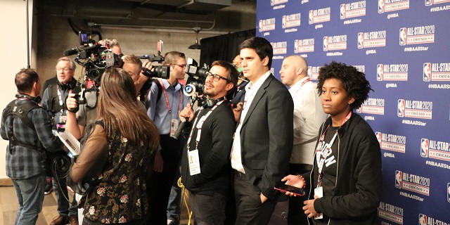Students interact with other members of the media at the NBA All-Star Game.