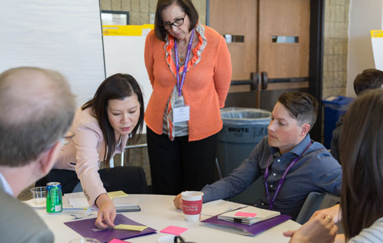 People working together around a table.