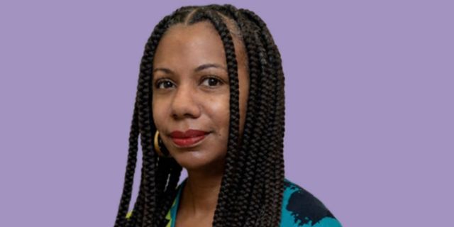 Headshot of Natalie Moore.