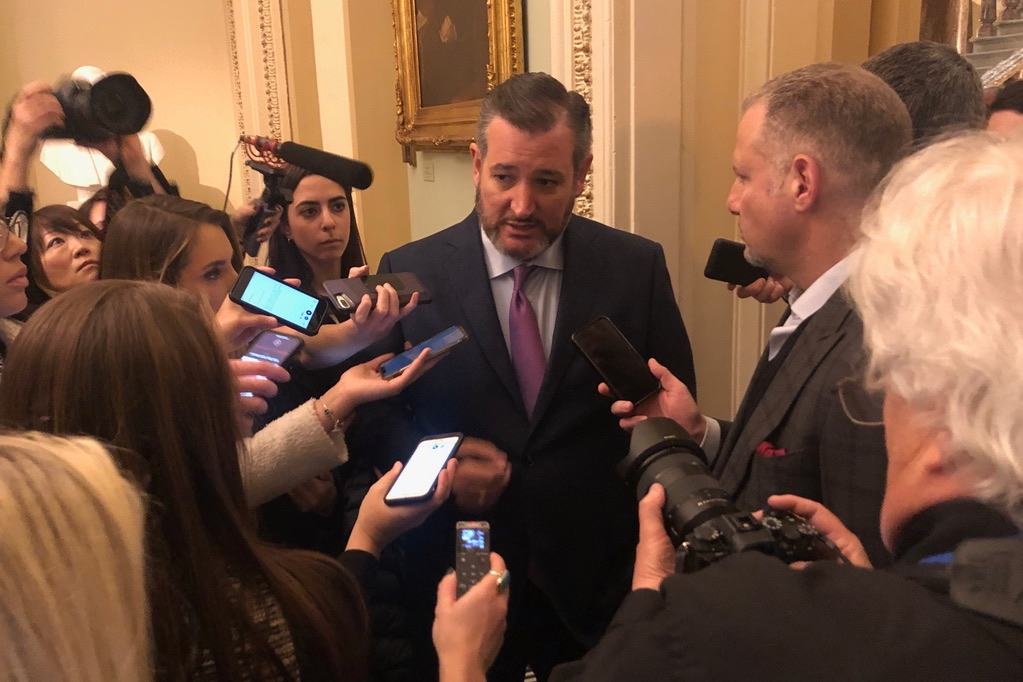 A Medill student and other journalists interview Sen. Ted Cruz.