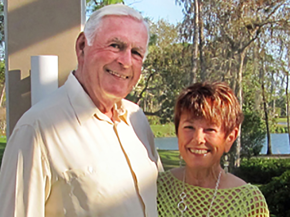 Bob Mulholland and his wife Judith pose for a photo.