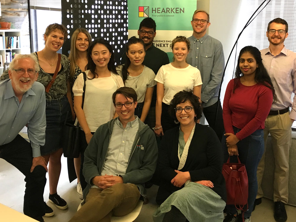 Students, faculty and employees pose for a photo at Civic Exchange