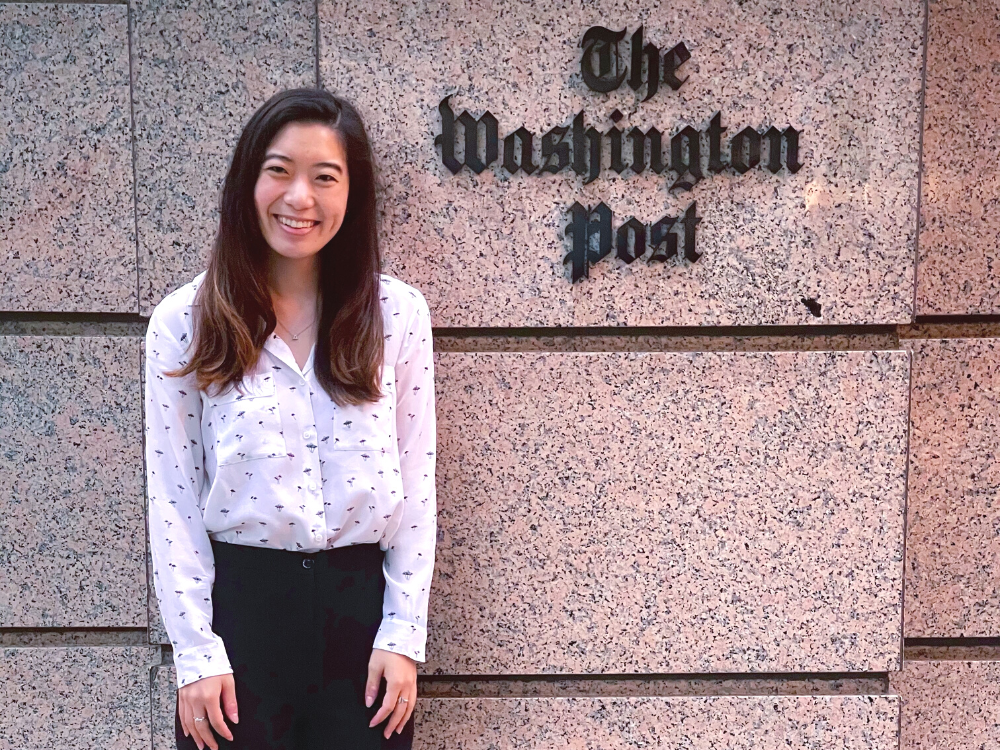 Allyson Chiu posing in front of the Washington Post building.