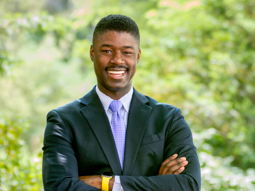 Medill alumnus Katanga Johnson poses for a photo