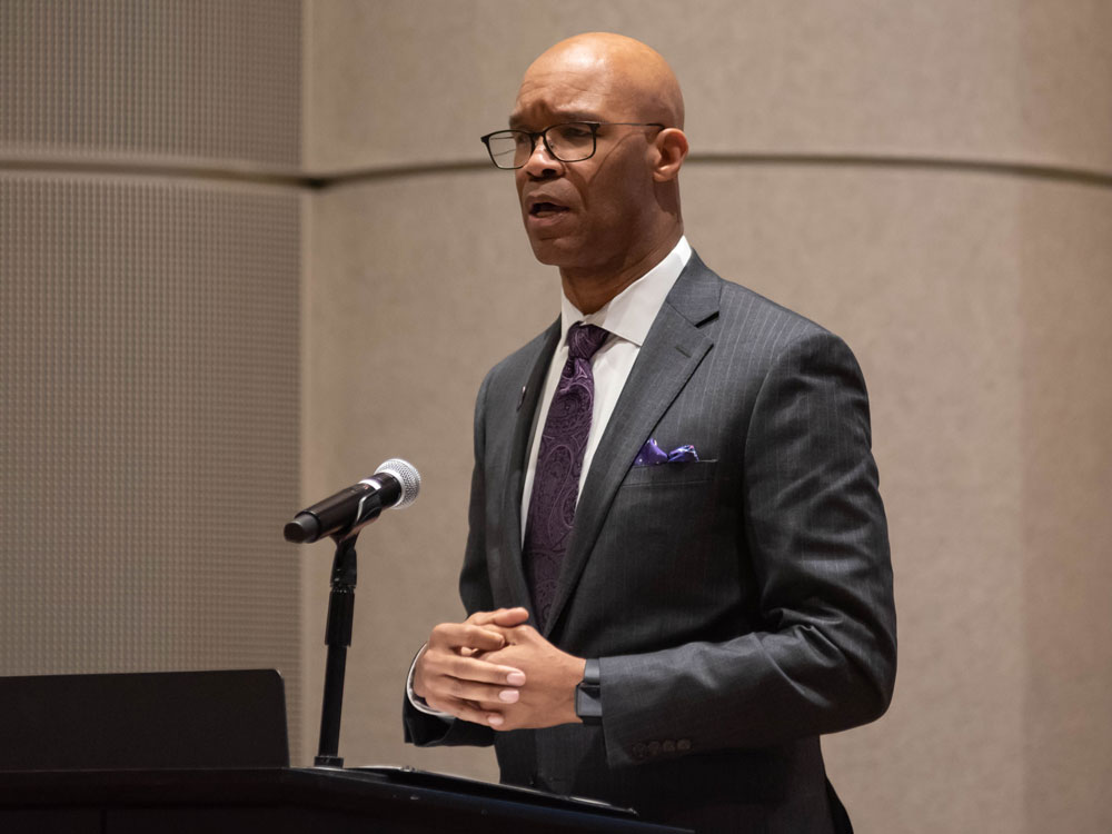 Medill Dean Charles Whitaker speaking