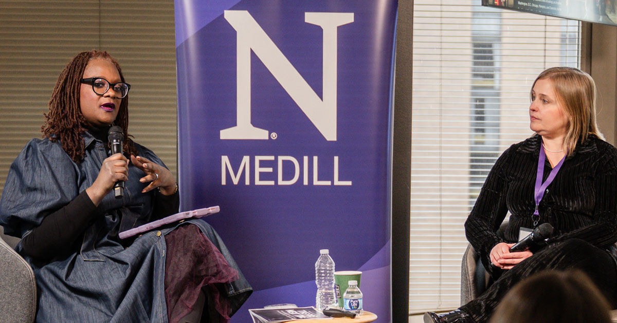 Deborah Douglas speaking on stage.