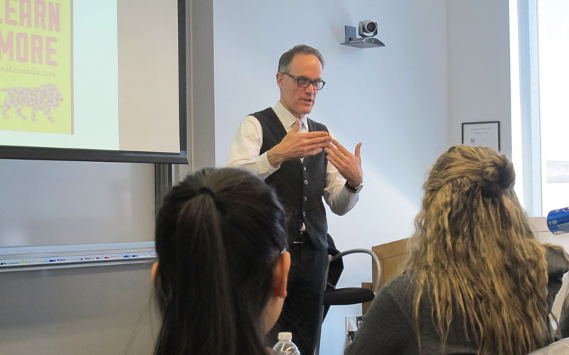 Dean Murphy speaking with students.