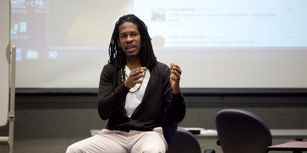 LZ Granderson at the front of a classroom.