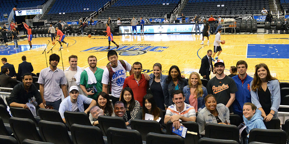Students get a courtside view before the Orlando Magic game at the Amway Center.
